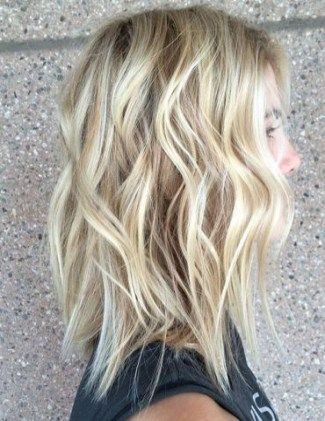 The best Layered Bob with Beach Waves and Blonde Balayage 2024 3
